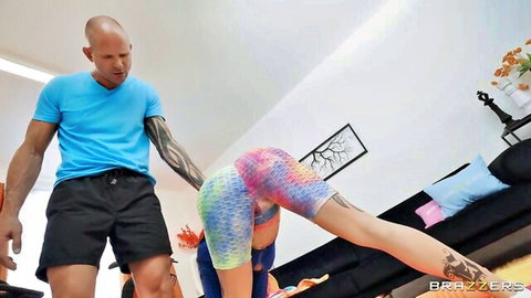Lacey Jayne bends over in tight colorful leggings for personal trainer session