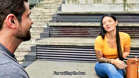 Sexy fit Latina in yellow top and jeans waiting bus, teasing horny stranger