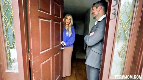 Blonde MILF stepmom in skirt greets suited stepson at door teasing taboo encounter