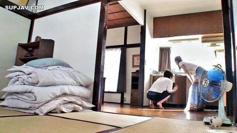 Skinny Japanese babe in skirt bends over as guy kneels behind grabbing her hips