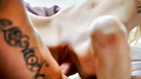 Blonde tattooed woman in steamy intimate sex session