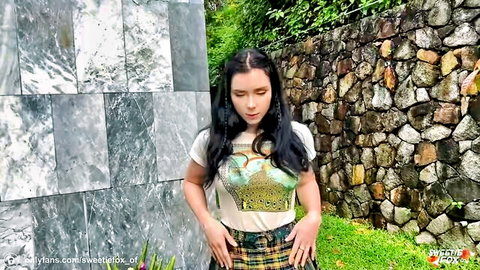 Sweetie Fox as naughty student in crop top and plaid skirt outdoors