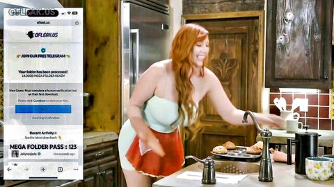 Lauren Phillips redhead stepmom in apron at kitchen sink, teasing MILF