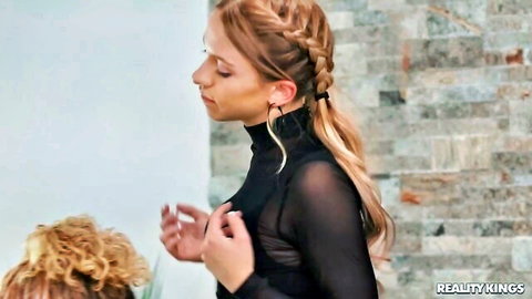 Khloe Kapri in sheer black turtleneck top, teasing touch