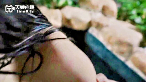 Asian woman with long wet black hair, topless side boob view in JAV uncensored pool scene