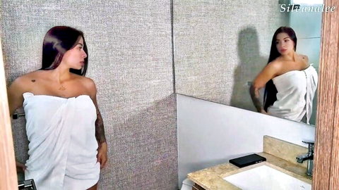 Silvana Lee seductive in white towel, mirror reflection in bathroom