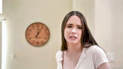 Hazel Moore with surprised expression in white top, adult thumbnail