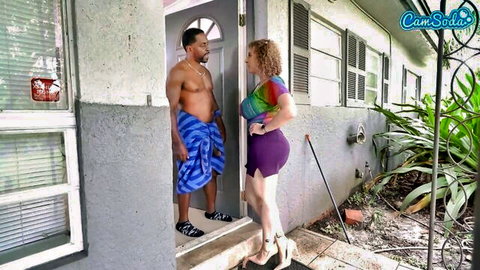 Muscular black stud in towel flirts with curvy blonde babe in short purple skirt outside motel