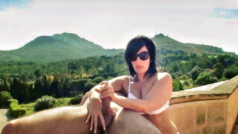Klixen in white bra jerks cock outdoors on terrace