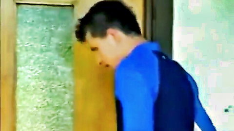 Cute athletic guy in blue tank top peeking in outdoor gay fuck scene