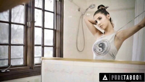 Gianna Dior poses seductively in yin-yang tank top mirror selfie
