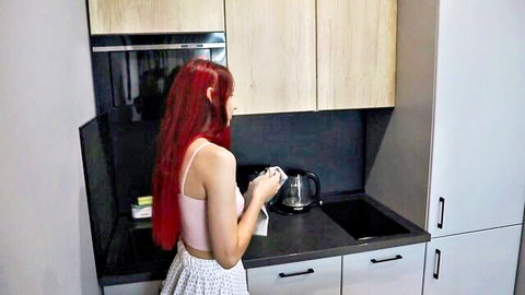 Sexy redhead in tank top and skirt in kitchen, teasing before anal creampie