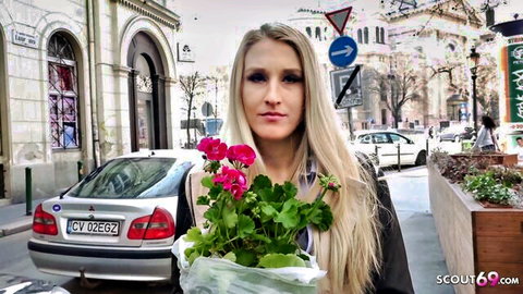 Hot blonde holding flowers on street, SCOUT69 blowjob teaser