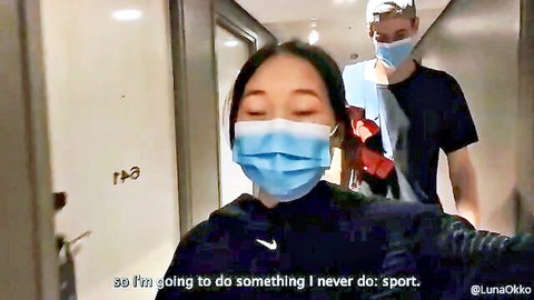 Luna surprised in hotel hallway with masked man pulling her arm
