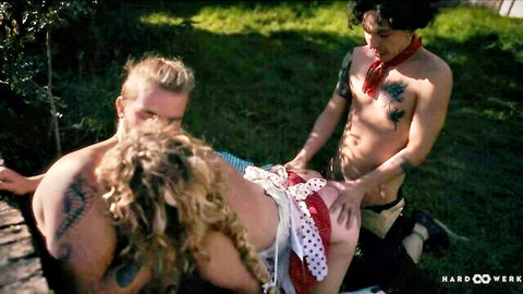Skinny curly blonde with small tits fucked missionary outdoors by tattooed stud in MMF threesome