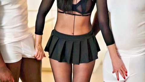 Brunette in sheer top and mini skirt gropes big cock bulges in white briefs of black and white studs
