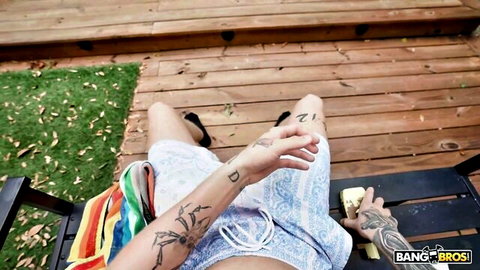 Daisy Phoenix in sunlit outdoor tease, tattooed arms, stepsister fantasy