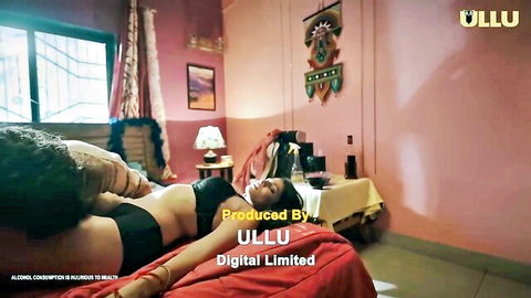 Indian woman in black lingerie lying seductively on bed in Dekho Pyaar se