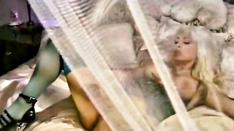 Horny blonde housewife in green stockings masturbating with toy