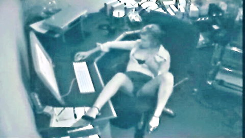 Horny blonde office slut teasing solo at desk in open blouse and shorts