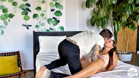 Tattooed guy roughly fucking skinny brunette's ass doggystyle on bed