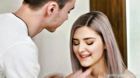 Eva Elfie smiling as partner kisses her neck intimately
