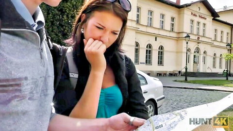 Brunette tourist girlfriend in blue top looks at map with man on European street, Hunt4K pickup tease
