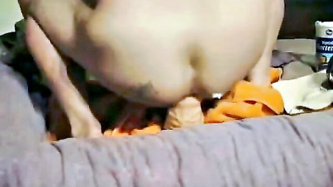 Solo woman stretching anus with massive anal toy close-up