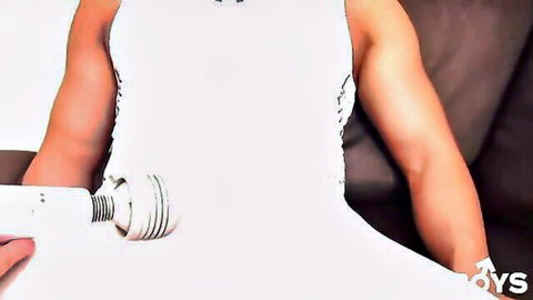 Jin in white wedding dress holding wand vibrator, crossdressing tease