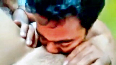 Bangladeshi young couple in intimate breast kissing foreplay