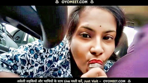 Indian girlfriend teasing with lollipop in car, big boobs visible in blue top