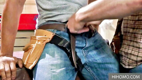 Gay construction worker grabs buddy's jean belt and tool pouch crotch in garage tease
