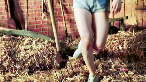 Truelove-Luna in tight denim shorts running through barn hay