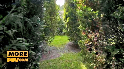 Natalie Grace POV rear view in sunny garden path, teasing taut ass