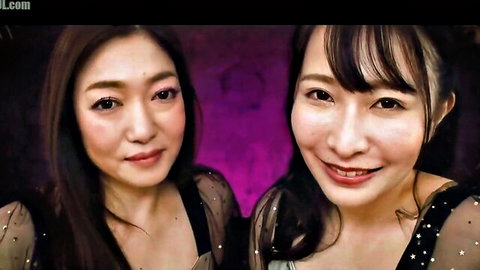 Two Asian beauties in sheer lingerie smiling seductively for JAV scene