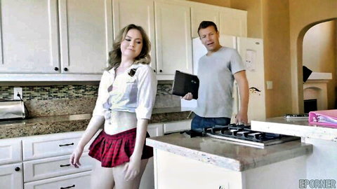 Britney Light in schoolgirl outfit with man, teasing pose