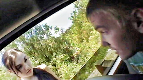 Skinny pale brunette with small tits topless beside man in car