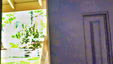 Elena Koshka in sheer white dress teasing by doorway