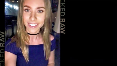 Anya Olsen blonde smiling in navy blue off-shoulder top and choker