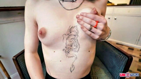Jules TGirl debut: Topless with dragon tattoo on small tits, black pantyhose