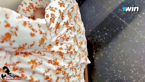 Sri Lankan stepsister in floral dress, teasing from behind