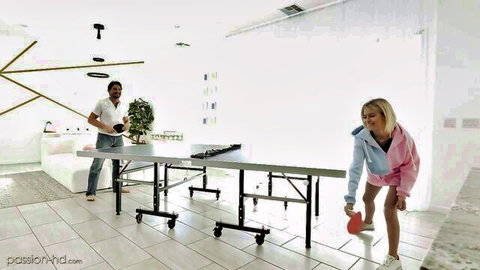 Kiara Cole in pink hoodie teasing with ping pong paddle