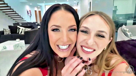 Busty brunette and blonde babes in tight red dresses smile with huge tits cleavage in selfie