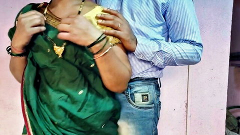 Mumbai Ashu in green saree hugged by man in Indian couple embrace