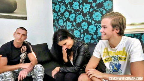 Alex Black emotional in wife swap scene with two men on couch
