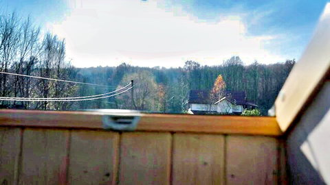 Tiana's scenic autumn balcony view in Hegre's A Day In The Life 2