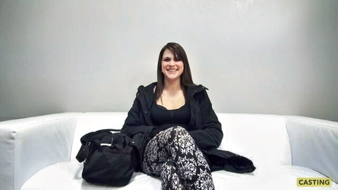 Katerina smiling in black parka casting session