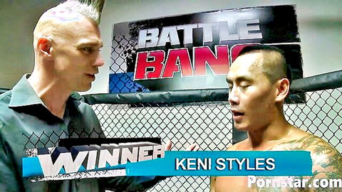 Shirtless Keni Styles holds winner sign after Battle Bang fight in cage interview