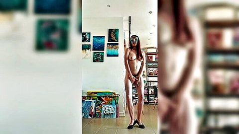 Nude woman posing as live sculpture in art gallery, high heels