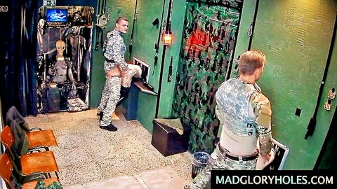 Muscular army boys in camo uniforms fucking in glory hole booth